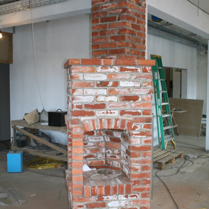 Arinn í veitingasal á jarðhæð